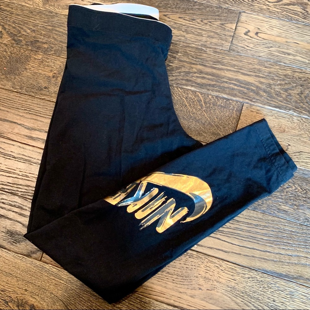Black and rose gold Nike leggings
